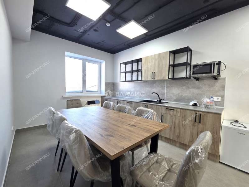 здание под офис, торговую площадь на улице Ларина